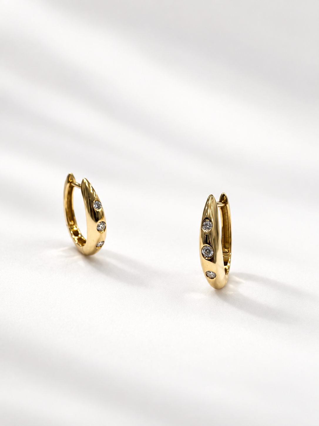 Gold Orbit Diamond Huggie Earrings